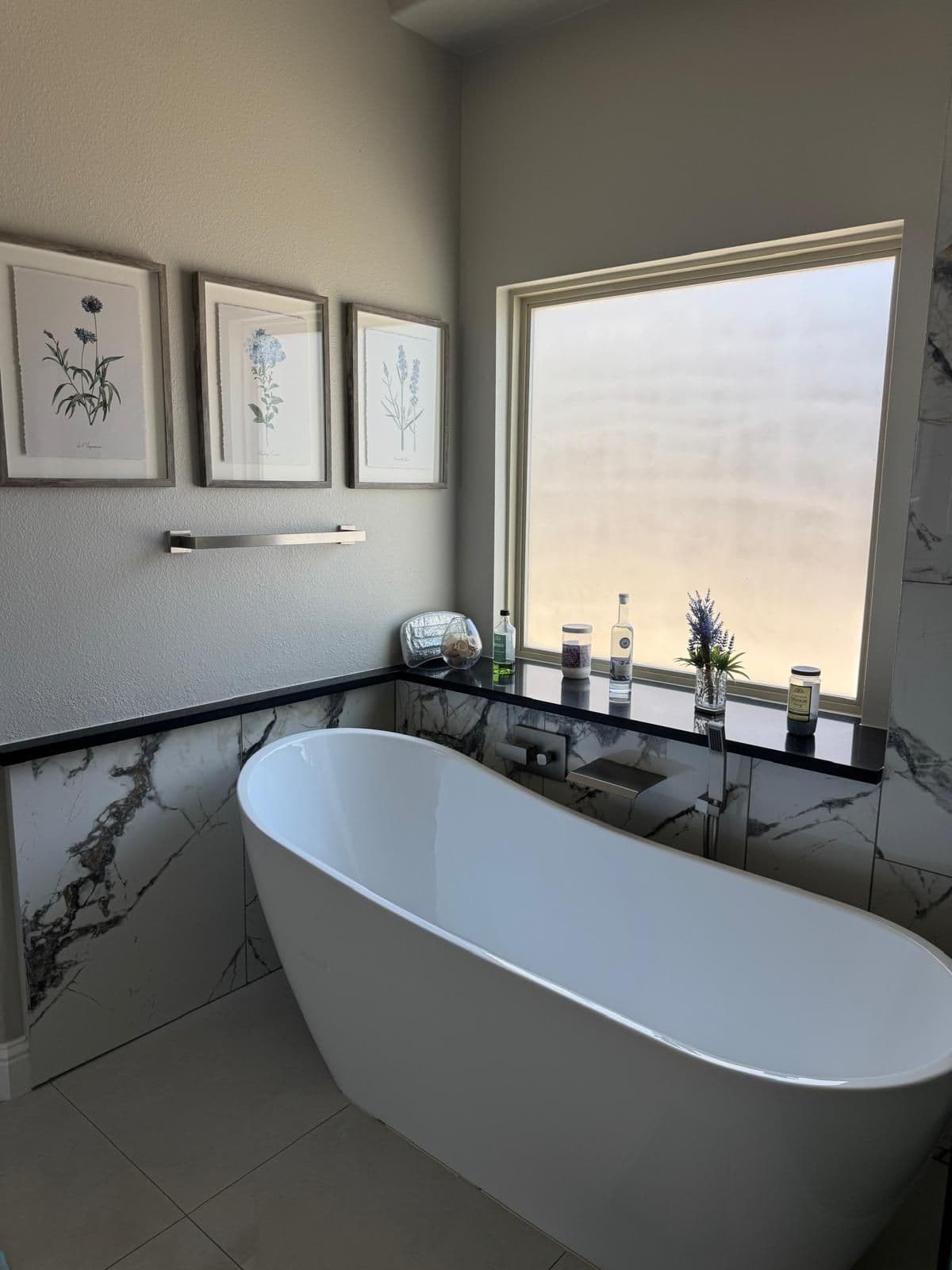 Luxury spa bathroom renovation with custom tile, walk-in shower, and modern fixtures — Denver CO